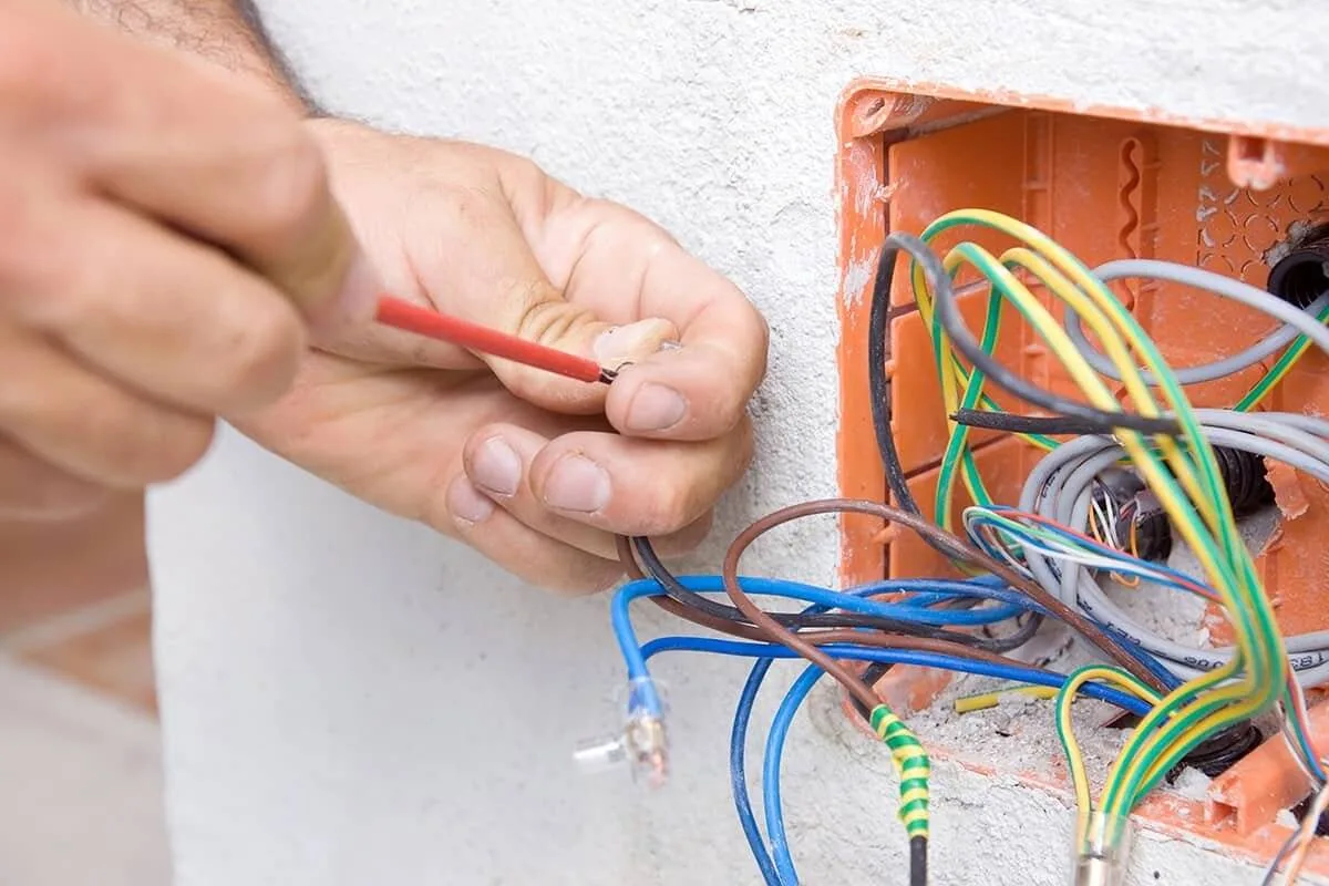 Electrician upgrading household wiring